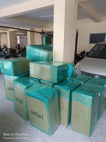 Cartons ready at a building lobby – packers and movers in Lucknow